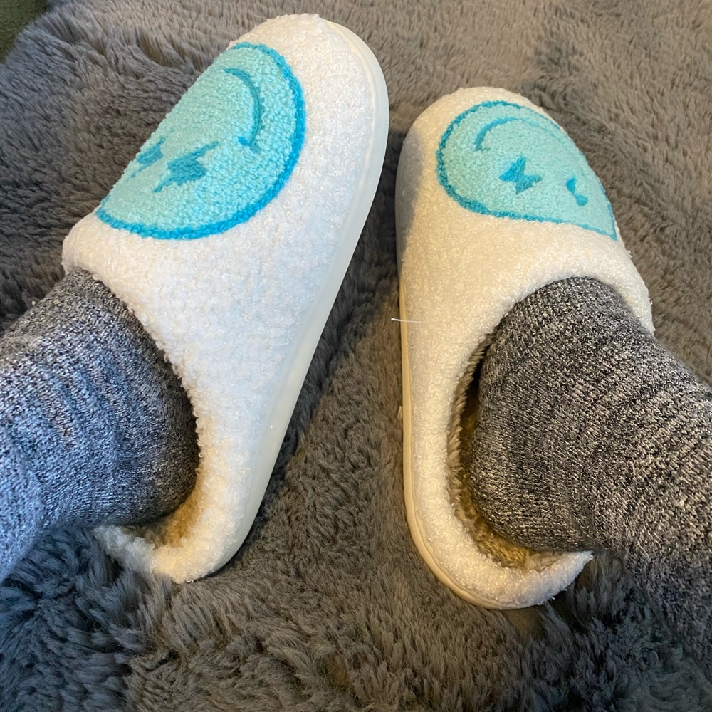 Blue lighting bolt smiley face slippers
